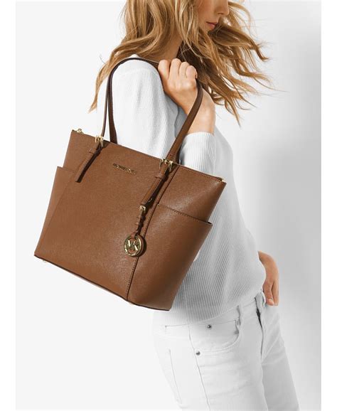 michael kors jet set east west zip tote|Michael Kors saffiano tote.